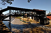 Inle Lake Myanmar. All the buildings are constructed on piles. Residents travel around by canoe, but there are also bamboo walkways and bridges over the canals, monasteries and stupas. 